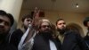 Hafiz Saeed, head of the Pakistan's Jamaat-ud-Dawa group waves to supporters at a mosque in Lahore, Pakistan, Nov. 24, 2017.