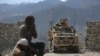 U.S. forces and Afghan security police are seen in Asad Khil near the site of a U.S. bombing in the Achin district of Jalalabad, east of Kabul, Afghanistan, April 17, 2017. 