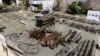 Pakistan army display confiscated ammunition, reportedly from militants Miranshah, after driving out militants from Pakistan's tribal region of North Waziristan along the Afghanistan border, July 9, 2014. 