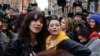 Actresses Asia Argento, left, and Rose McGowan pose during a demonstration to mark International Women's Day in Rome, March 8, 2018. Asia Argento, an Italian actress who helped launch the #MeToo movement, is launching a new movement, #WeToo, which aims to