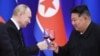 Tổng thống Nga Vladimir Putin (trái) và lãnh đạo Triều Tiên Kim Jong Un tại tiệc chiêu đãi cấp nhà nước ở Bình Nhưỡng, Triều Tiên, vào ngày 19/6/2024.