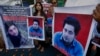 Members of a Pakistani civil society take part a demonstration against the killing of Mohammad Mashal Khan, a student at the Abdul Wali Khan University in the northwestern city of Mardan, in Karachi, Pakistan, Saturday, April 22, 2017. A mob in the northw