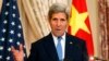 Ngoại trưởng Hoa Kỳ John Kerry và Ngoại trưởng Việt Nam Phạm Bình Minh, trong cuộc họp báo tại Bộ Ngoại giao Hoa Kỳ trong thủ đô Washington, 2/10/14