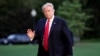 FILE - U.S. President Donald Trump waves as walks on the South Lawn of the White House upon his return to Washington, from the G-20 Summit in Hamburg, July 8, 2017. 