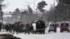 Army vehicles and ambulances gather outside the Bethel Memorial Methodist Church after an attack by gunmen, in Quetta, Pakistan, Dec. 17, 2017.