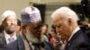 United States Vice President Joe Biden (R) greets Imam Sheikh Sa'ad Musse Roble of Minneapolis, Minnesota 